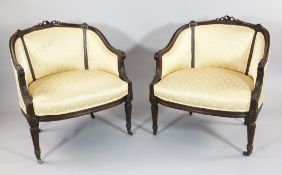 A pair of 19th century Louis XVI design tub shape chairs, with gold pattern fabric, on fluted