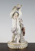 A Meissen figure of Cupid with a bird in hand, blue crossed swords mark, incised model no.F53, 6in.