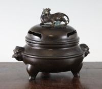 A Chinese bronze censer and cover, Xuande four character mark but later, of compressed globular form