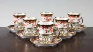 A set of six Royal Crown Derby Imari pattern 2649 silver mounted coffee cups and saucers, with