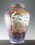 A Large Japanese Imari ovoid vase, Meiji period, painted with a kneeling warrior and a sage below