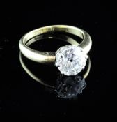 An 18ct gold and solitaire diamond ring, the round brilliant cut stone weighing approximately 2.0ct,