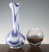 Two Leerdam Unica Art glass vases, the first of bottle form decorated with blue and white swirls,