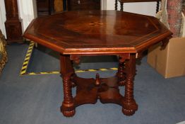 A 19th century octagonal topped centre table, with walnut and mahogany veneers and rosewood