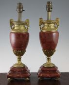 A pair of rouge marble and gilt metal mounted table lamps, in Louis XVI style, 15.5in.