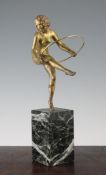 Aurore Onu. An Art Deco gilt bronze figure of a hoop dancer, on square marble base, signed, 13in.