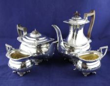 A matched late Victorian and later demi fluted silver four-piece tea and coffee set, of oval form,