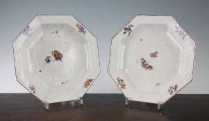 A pair of Chelsea octagonal plates, c.1755, decorated with flowers and butterflies, 9in.