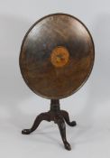A George III circular tilt top tripod table, with fan and musical trophy marquetry inlay, birdcage
