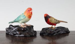 Two Japanese coloured ivory figures of birds, early 20th century, the first a red and turquoise