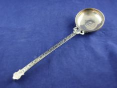 A mid 19th century Russian 84 zolotnik silver and niello ladle, with foliate decorated handle and