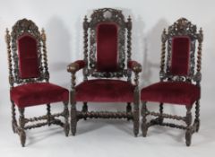 A harlequin set of eleven Victorian Carolean style oak dining chairs, with barley twist uprights,