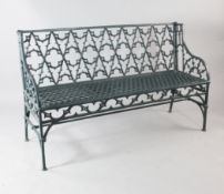 A late 19th century French cast iron Gothic bench, now painted blue, with pierced honeycomb seat,