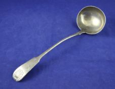 An early Victorian Scottish silver fiddle and shell pattern soup ladle, with engraved armorial,
