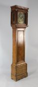 Arthur Hurt, Ashford. A George III oak eight day longcase clock, the 11 inch square brass dial