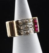 A 1950`s? gold, ruby and diamond set dress ring, size J.