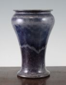 A Ruskin bluish purple glazed vase, of inverted baluster shape, impressed Ruskin Pottery West