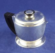 A 1930`s Art Deco French 950 standard silver bachelor`s teapot by Jean Puiforcat, of circular