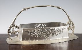 A Urania Friedrich Adler pewter and glass oblong centrepiece, with naturalistic handle and pierced