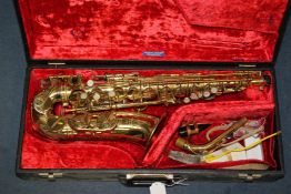 A Selmar Mark VI lacquer brass Alto saxophone, with mother of pearl inset keys, numbered 197177, c.