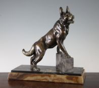 A 19th century French patinated metal figure of an Alsatian, on black veined marble and brown onyx