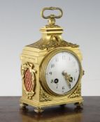 An early 20th century French ormolu `pendule d`officier`, with enamelled arabic dial and movement