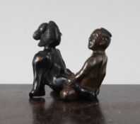 A Japanese bronze erotic group, early 20th century, with two colour patination, 2.5in.