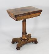 A Victorian rosewood games / work table, with folding top and saltire platform, 1ft 9in.