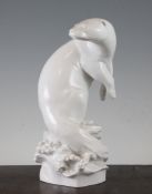 A Meissen `Weiss` glazed porcelain figure of an otter, modelled by M. Esser, impressed marks and