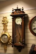 A Gustav Becker walnut cased Vienna wall clock, with enamelled Roman dial and subsidiary seconds,