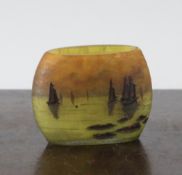 A Daum cameo etched glass match holder, c.1910, decorated with brown sailing boats on an orange /