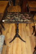 An early Victorian lacquer and mother of pearl tripod occasional table, the top decorated with