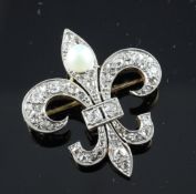 A gold, diamond and cultured pearl set fleur de lis brooch, 1.25in.