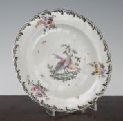 A Chelsea plate, c.1756, decorated with fantastic birds and flowers, brown anchor mark