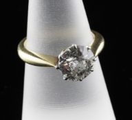 An 18ct gold solitaire diamond ring, the round brilliant cut stone weighing approximately 1.65ct,