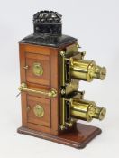 A Victorian mahogany and lacquered brass biunial magic lantern, mounted with a plaque for W.A