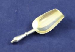 A 19th century Russian 84 zolotnik silver caddy spoon by Ivan Khlebnikov, with turned handled, St.