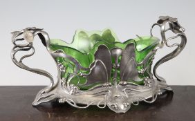 A WMF pewter and green glass butterfly centrepiece, with scrolling tendrils, flowerhead and