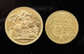 A George V 1911 gold sovereign and a Victorian 1865 gold half sovereign.