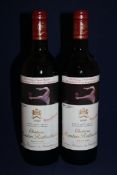 Two bottles of Chateau Mouton-Rothschild 1990, Premier Cru Classe, Pauillac; both just into neck,