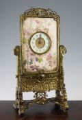 A Victorian aesthetic movement ormolu and pottery mantel timepiece, modelled as an oriental