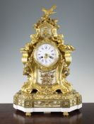 A 19th century French ormolu and white marble mantel clock, of Louis XVI style, with enamelled Roman