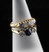 Two early 20th century 18ct gold, sapphire and diamond dress rings, both size L.