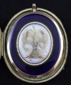 A large 19th century gold, two colour enamel and seed pearl set oval mourning pendant, each panel