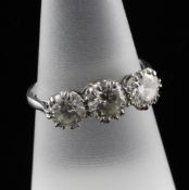 An 18ct white gold and three stone diamond ring, total diamond weight approximately estimated at 1.