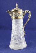 A late Victorian silver mounted hob nail cut glass claret jug, by William Comyns, of oval form, with