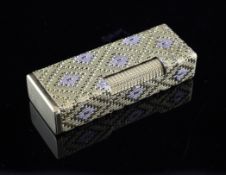 A 1960`s 18ct two colour gold Dunhill lighter, retailed by Bulgari, Italy, of rectangular form, with