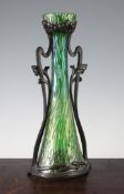 An Art Nouveau Kralik green diaspora glass vase, with stylised Art Nouveau pewter mounts,