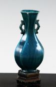 A Chinese turquoise glazed porcelain hexagonal baluster vase, 18th / 19th century, with bat-shaped