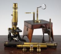 A Victorian Henry Crouch lacquered brass microscope and case, together with a Thomas Harris & Sons